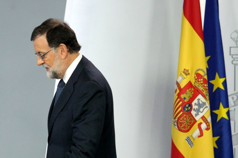 MARIANO RAJOY. Spain's Prime Minister Mariano Rajoy leaves after giving a press conference following a crisis cabinet meeting at the Moncloa Palace on October 11, 2017 in Madrid. Photo by AFP. 
