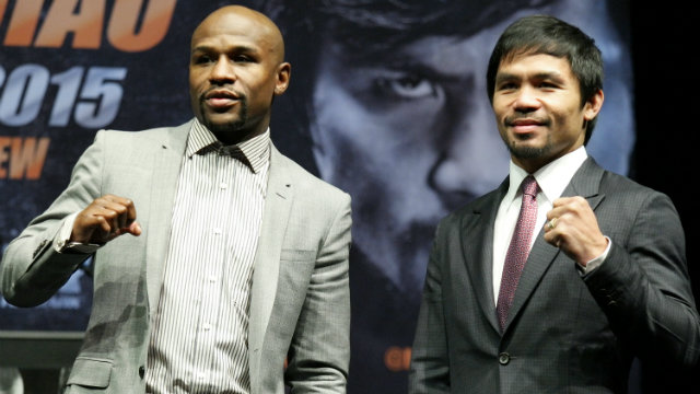 Floyd Mayweather Jr (L) will make over $100 million for his fight against Manny Pacquiao (R) this weekend. File photo by Jonathan Alcorn/EPA
 