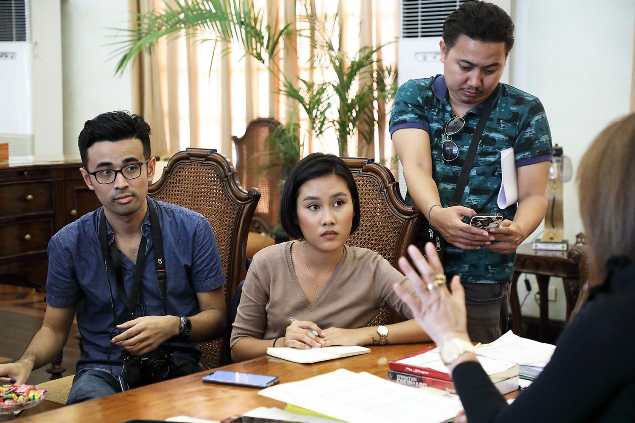 RYAN MACASERO (left) with other reporters at the Cebu provinceâs Public Information Office 