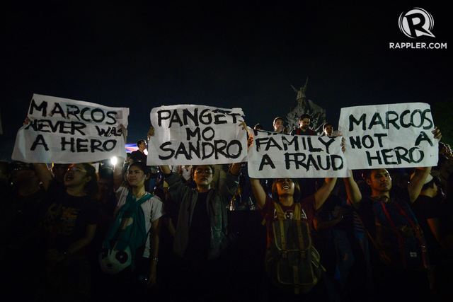 'NEVER A HERO.' Protesters at the People Power Monument urge motorists to honk their car horns in protest of the Marcos burial at the Libingan ng mga Bayani on November 18, 2016. File photo by LeAnne Jazul/Rappler  