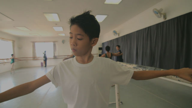 One of Tuloy's kids practices ballet in the One Academy dance studio. 