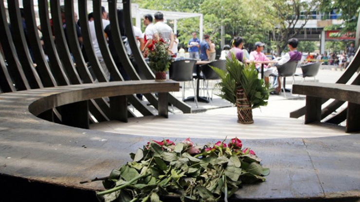A YEAR AFTER. Flowers are left at the site for victims two days after a bomb attack at a popular restaurant in Cagaya de Oro. Photo by JB Deveza/AFP