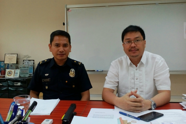 PUBLIC SAFETY. Inspector Marlo Serito, chief of Prevention and Inspection Section of the BFP, and DILG Public Safety Undersecretary JV Hinlo talks to Rappler about the alleged corruption within BFP. Photo by Aika Rey/Rappler  