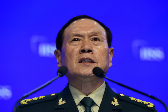 SHANGRI-LA DIALOGUE. China's Defense Minister Wei Fenghe attends the IISS Shangri-La Dialogue summit in Singapore on June 2, 2019. Photo by Roslan Rahman/AFP 