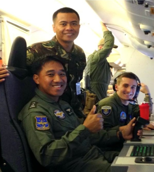 BILATERAL PATROL MISSION: Pilots of the Philippine military are shown the electro-optical camera of the P-8A Poseidon. US Navy photo  