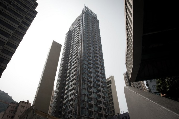 SCENE OF THE CRIME. A general view shows the J residence building in Hong Kong on November 2, 2014. Nicolas Asfouri/AFP