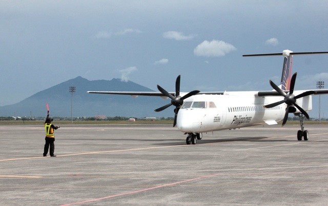 GROWING HUB. A Philippine Airlines Bombardier Turpoprop awaits instructions on the tarmac at Clark International Airport. File photo from the Department of Transportation 