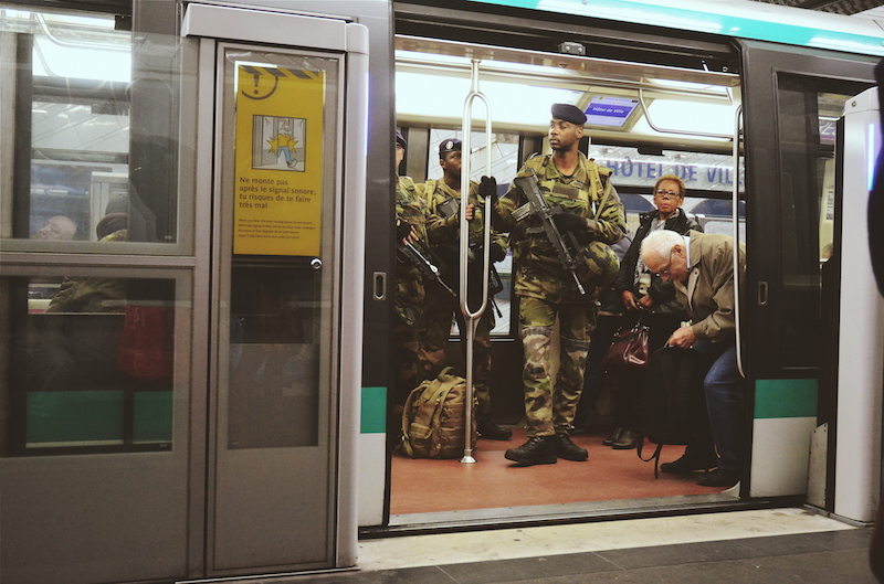 NEW NORMAL. Soldiers check trains as Paris remains on high alert. Photo by Chad Versoza  