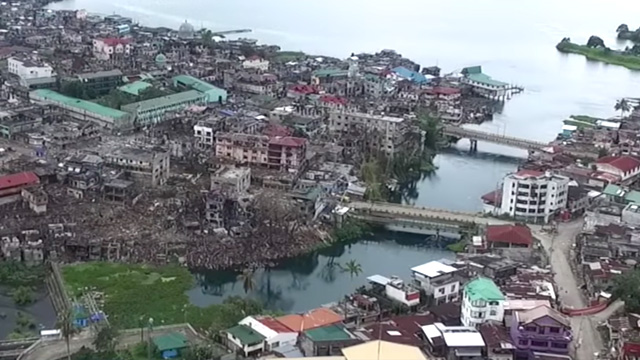 MARAWI BRIDGES. The Agus River separates the safe zone and the battle zone. Screenshot of a drone video by the Provincial Crisis Management Committee 