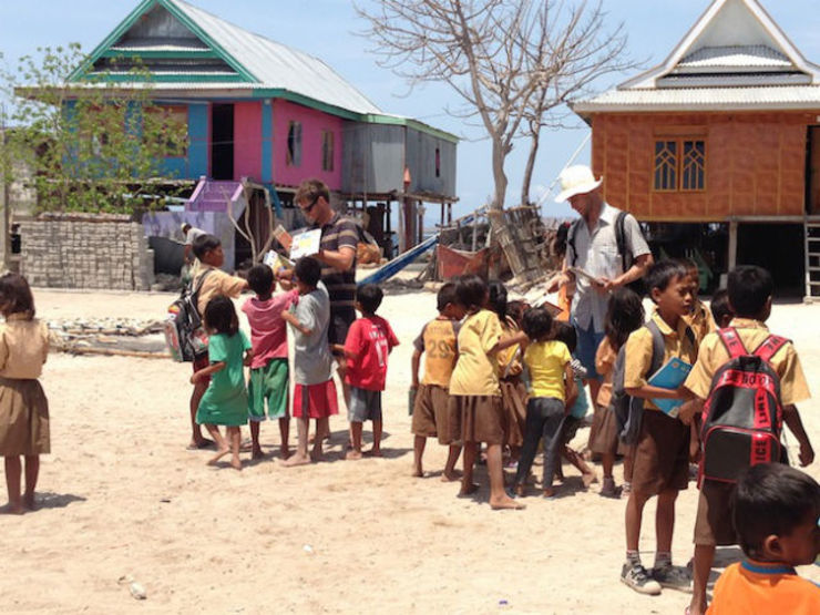 SURREAL EXPERIENCE. The writer, Zack, seen here during the first time he distributed books to children in Messah. 