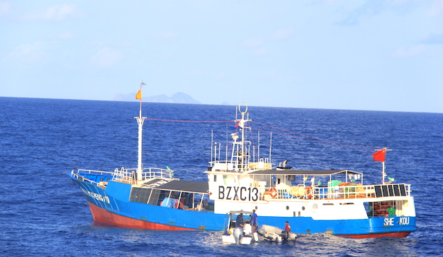 SUSPECTED CHINESE POACHERS. Philippine authorities intercept a Chinese fishing vessel flying an inverted Philippine flag in waters between Babuyan Island and Batanes on May 16, 2016. Photo courtesy of BFAR 