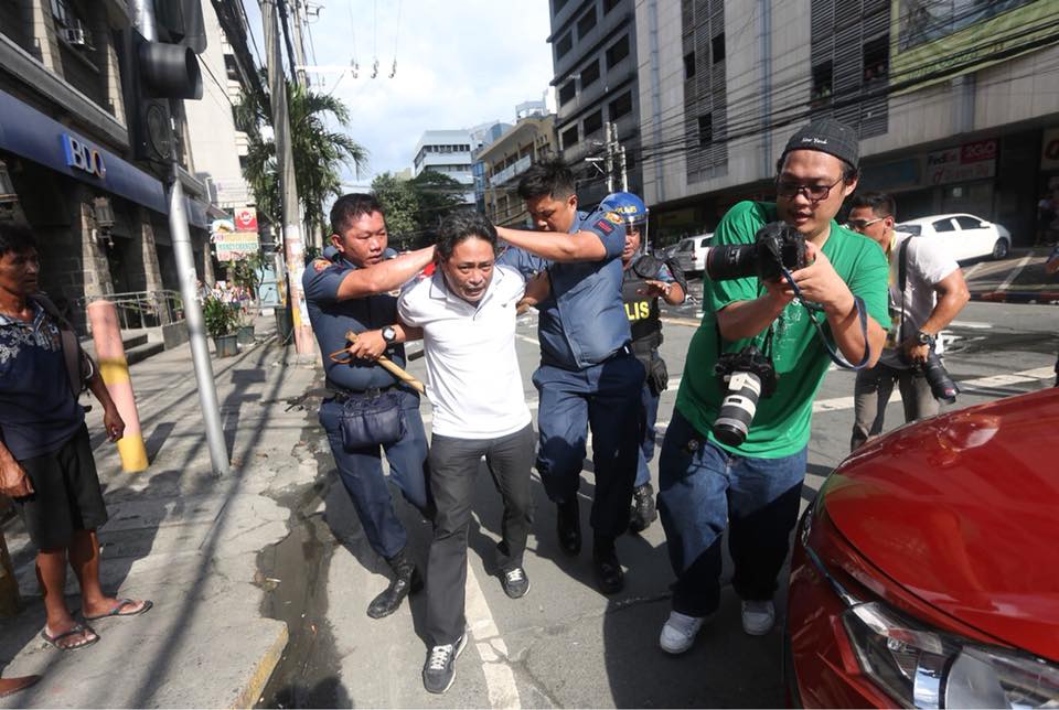 ARREST. Police and human rights group Karapatan tell different stories surrounding the arrest of Karapatan member Neil Legaspi on Sunday, November 12. Photo by Karapatan