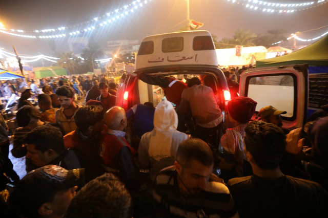 VIOLENCE. An ambulance arrives in Tahrir square after unidentified men attacked an anti-government protest camp in Baghdad late on December 6, 2019. Photo by stringer/AFP 