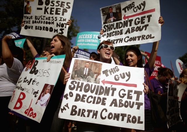 PROTEST. Supporters of employer-paid birth control rally in front of the Supreme Court before the decision in Burwell v. Hobby Lobby Stores was announced June 30, 2014 in Washington, DC. Photo by Chip Somodevilla /Getty Images /AFP 