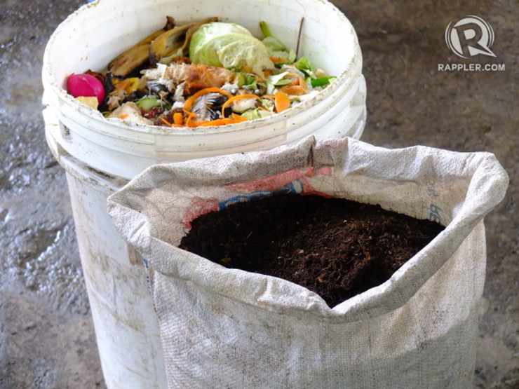 TRASH TO TREASURE. Household waste (in canister) is turned into compost used as fertilizer for vegetables and herbs