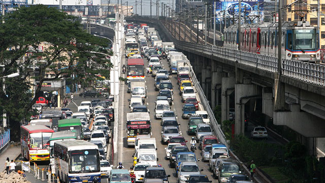 TRAFFIC. The Japan International Cooperation Agency says traffic will cost the Philippines up to P6 billion a day by 2030. File photo by Romeo Gacad/AFP 