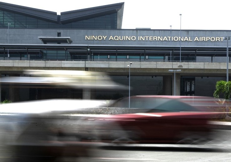 COMFORT SOON. The government says installation of new toilet facilities and aircon systems at the Ninoy Aquino International Airport terminals 2 to 4 will be completed before 2014 ends. File photo by Jay Directo / Agence France-Presse
