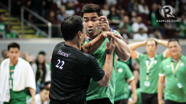 LOOK, REF! Aldin Ayo (R) hands glasses to a game referee. Josh Albelda/Rappler
