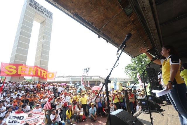 PROTECTING WORKERS. Camarines Sur Representative Leni Robredo addresses labor groups at a rally organized by SENTRO on May 1, 2016. Photo courtesy of Leni Robredo's media group 