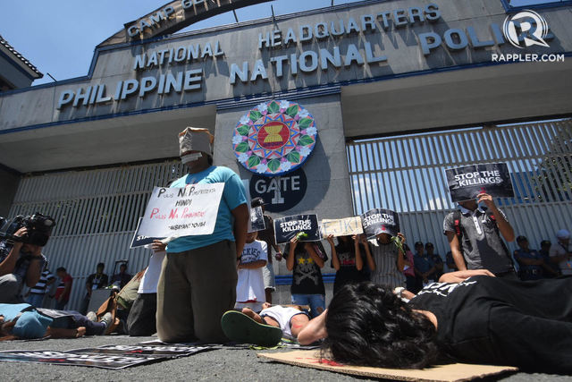 END. Protesters call for end to drug war killings in front of the PNP headquarters. File photo by Angie de Silva/Rappler 