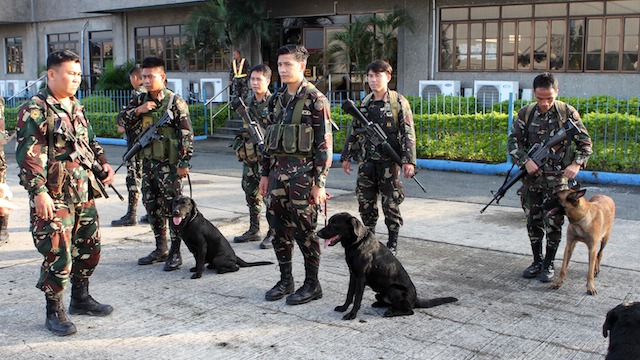 PROTECTION. K9 units line up for deployment to Sulu province. File photo from AFP-PAO   