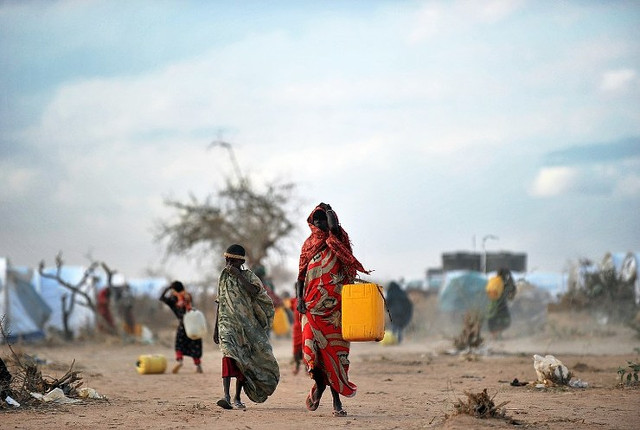 WATER CRISIS. A file photo taken in July 2011 shows Somali refugees fetching water during a period of drought when the United Nations declared a famine in several parts Somalia. File photo by Tony KARUMBA/AFP 