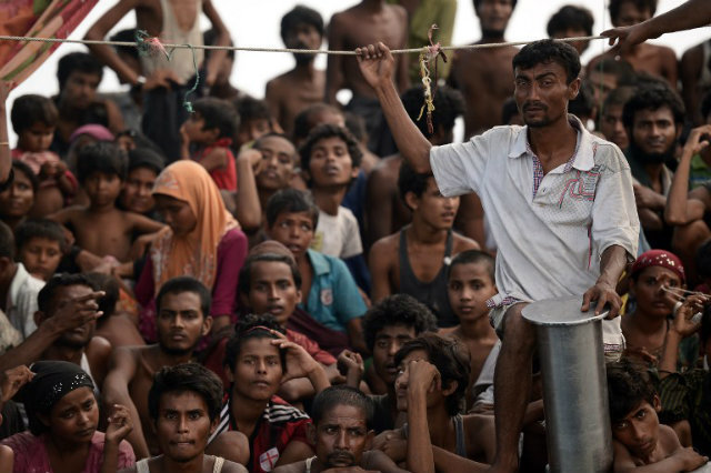 HUMANITARIAN CRISIS. This picture taken on May 14, 2015 shows Rohingya migrants on a boat drifting in Thai waters off the southern island of Koh Lipe in the Andaman. File photo by Christophe Archambault/AFP  