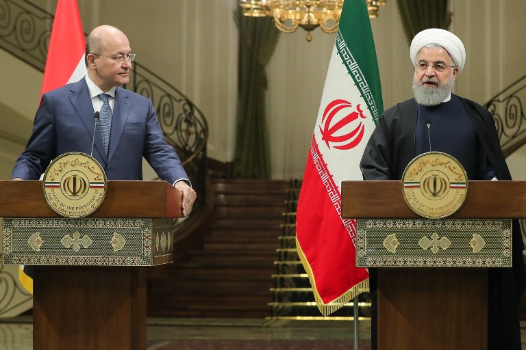 VISIT. This handout picture released by the Iranian presidency on November 17, 2018, shows Iran's President Hassan Rouhani and Iraq's President Barham Salih (L) during a press conference in Tehran. Photo by HO/IRANIAN PRESIDENCY/AFP 