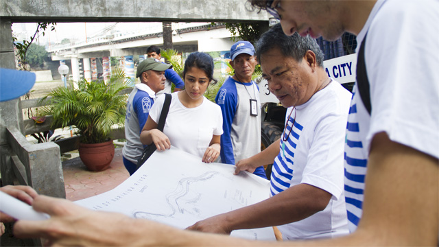 OPEN INNOVATION. Metro Manila Civic Innovation fellows assess Marikina River's landscape blueprint with government officials. Photo by Eugena Ossi/Five by Five