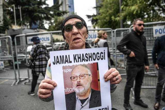 MISSING. A woman holds a portrait of missing journalist and Riyadh critic Jamal Khashoggi reading 'Jamal Khashoggi is missing since October 2' during a demonstration in front of the Saudi Arabian consulate on October 9, 2018 in Istanbul. File photo by Ozan Kose/AFP 