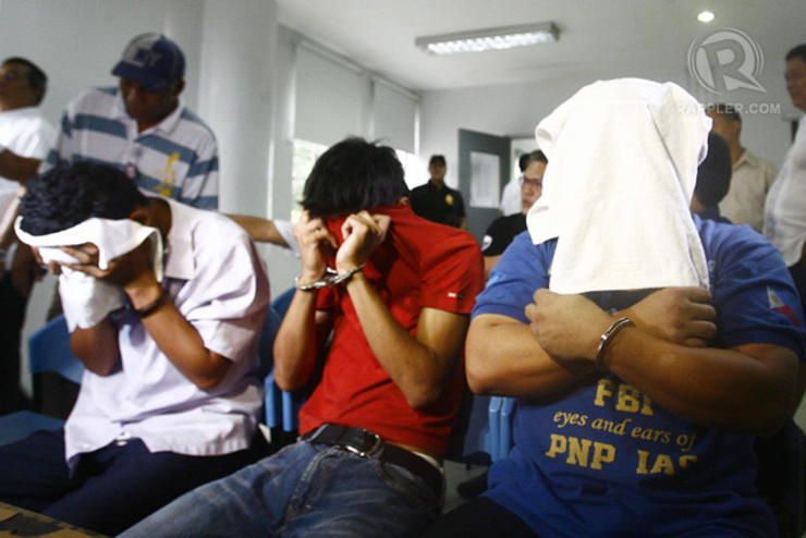 ANTI-CHINA GROUP? The 3  suspects in the foiled car bombing at the NAIA are presented to media at the NBI headquarters in Manila on September 2, 2014. Photo by Joel Leporada/Rappler
