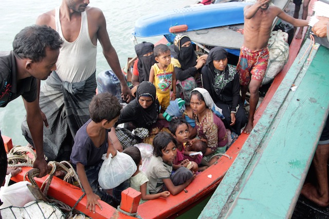 WOMEN AND CHILDREN. Refugees from Myanmar and Bangladesh are rescued by Aceh fishermen in Julok, East Aceh, Sumatra, Indonesia, on May 20, 2015. Photo by EPA