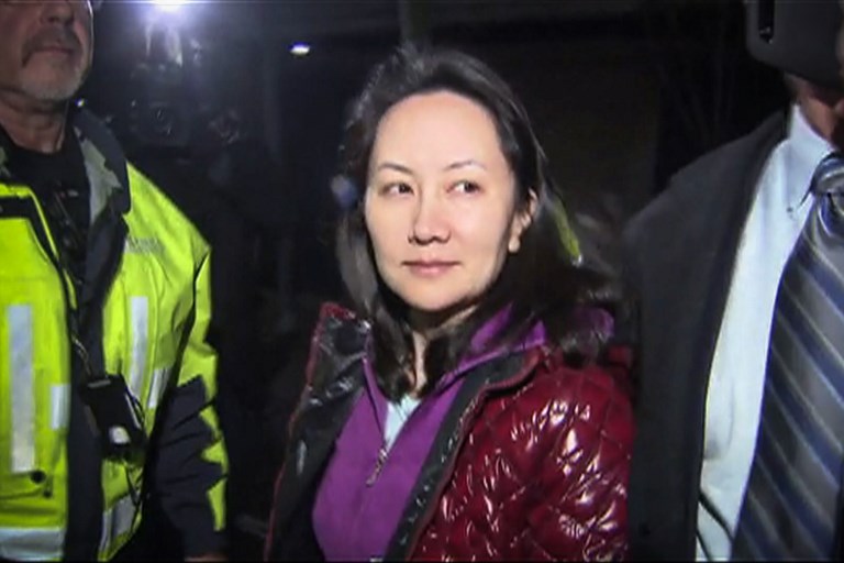 WANZHOU. This TV image provided by CTV to AFP shows Huawei Technologies Chief Financial Officer Meng Wanzhou as she exits the court registry following the bail hearing at British Columbia Superior Courts in Vancouver, British Columbia on December 11, 2018. CTV/AFP file photo  