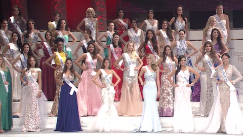 Miss Indonesia is seen with the other contestants in their evening gowns. 