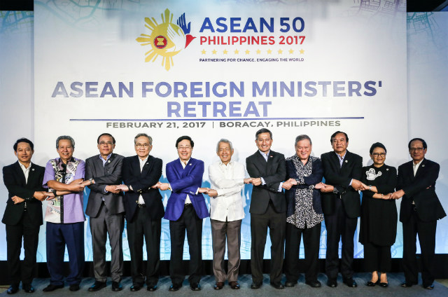TOP DIPLOMATS. Foreign ministers of the Association of Southeast Asian Nations link arms the ASEAN way during the ASEAN Foreign Ministers' Meeting on February 21, 2017. Photo release by ASEAN Media  