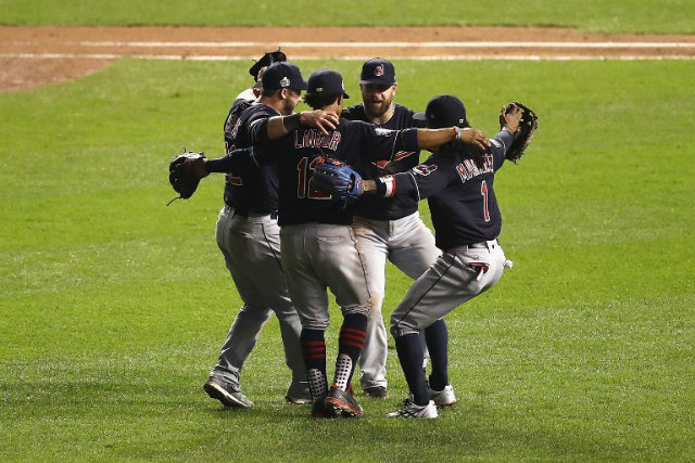 The Cleveland Indians celebrate after beating the Chicago Cubs 1-0 in Game Three of the 2016 World Series at Wrigley Field on October 28, 2016 in Chicago, Illinois. Elsa/Getty Images/AFP  