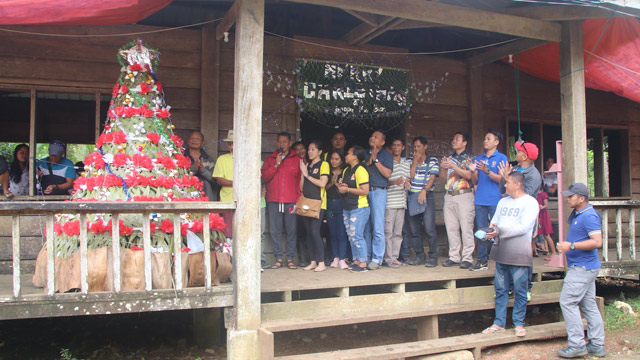 CELEBRATING CHRISTMAS. The Indigenous Peoples (IP) community in Sitio Simuwao in Surigao del Sur lights their first ever Christmas tree on Wednesday, November 24. Photo courtesy ofÂ 3rdÂ Special Forces âArrowheadâ Battalion, Philippine Army 