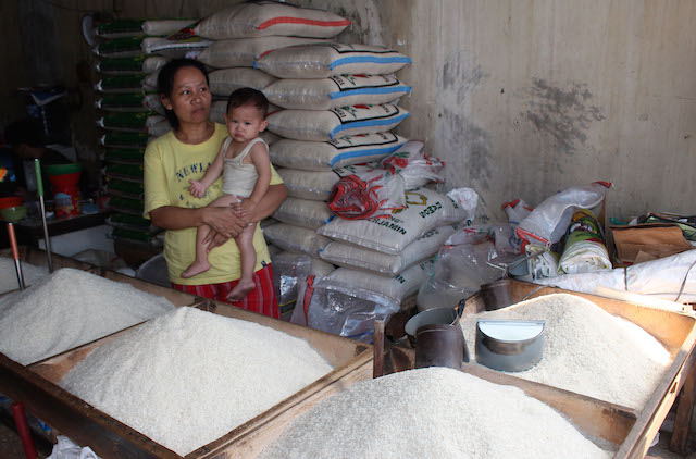 RICE PRICE. The price of some rice variants has risen by about 30% so far this year. Photo by Adi Weda/EPA 
