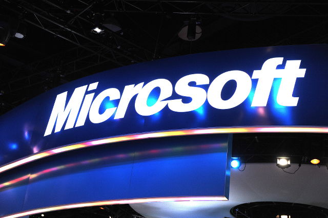 JOB CUTS. A file picture dated 06 January 2010 shows the Microsoft booth at the Consumer Electronics Show (CES) in Las Vegas, Nevada, USA. Andrew Gombert/EPA
