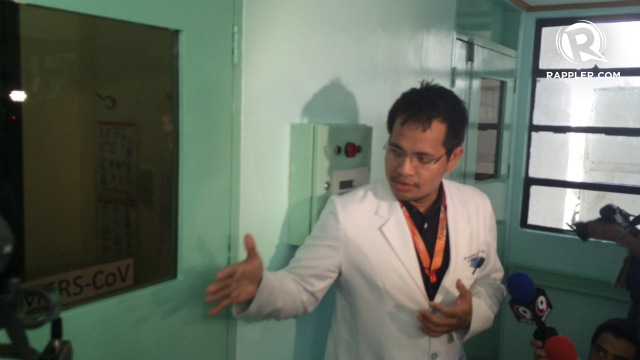 CALL OF DUTY. Dr Mark Pasayan of RITM explains the triage area of the hospital for possible Ebola and MERS-CoV patients. Photo by Jee Geronimo/Rappler