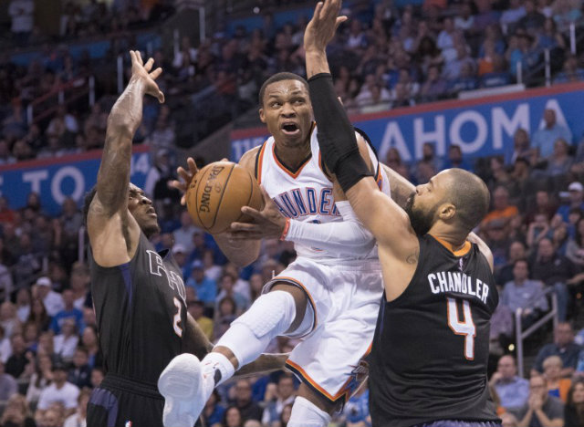 RUSS THE MACHINE. Russell Westbrook is undeterred going to the rim. File photo by J Pat Carter/Getty Images/AFP  
