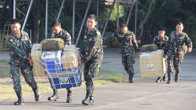 AIRDROP: The Philippine Navy airdrops supplies for the troops in Ayungin Shoal a month since the tense rotation mission. Photo from Western Command