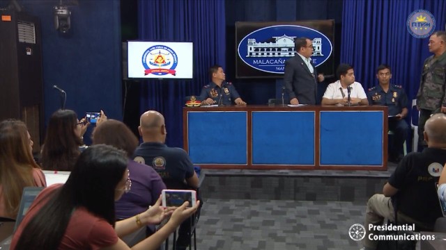 SUSPECT. Police officer Roger Rubio, a suspect in the killing of radio broadcaster Dindo Generoso, is presented to the media on November 15, 2019. Screengrab from PCOO  
