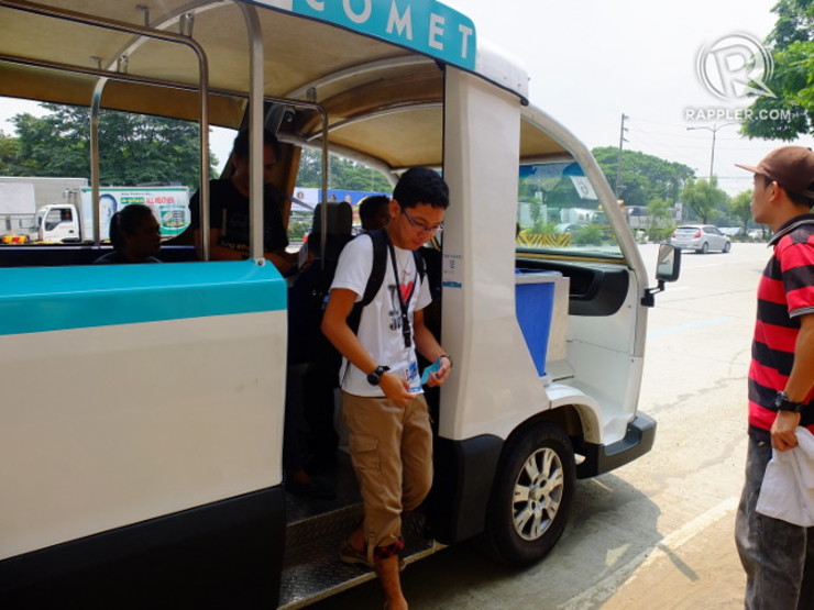 FIRST RIDE. Student John Domingo disembarks from his first ride on the COMET