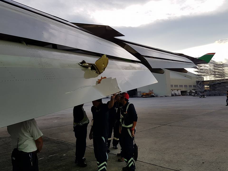 DAMAGE. The flaps of the EVA Air 272 were severely damaged by foreign object debris at the end of runway 24. Photo courtesy of Kurt Cabillon 