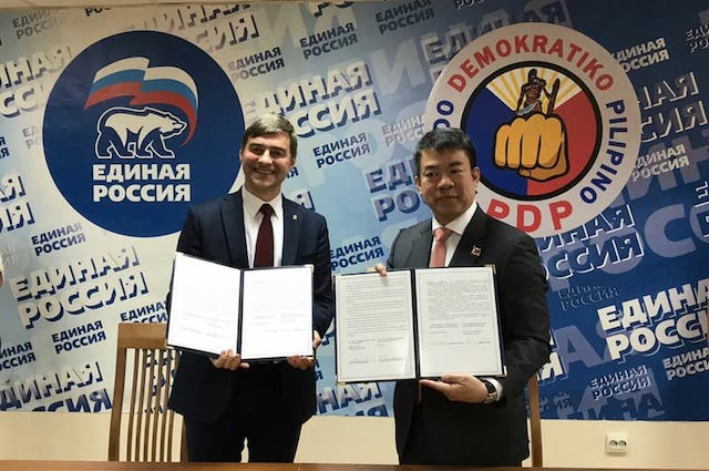 AGREEMENT. PDP-Laban signs a memorandum of understanding with Russian President Vladimir Putin's United Russia party. Photo from Pimentel's office  