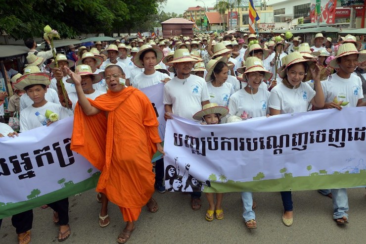 Cambodian activists march during the 29th World Habitat day in Phnom Penh on October 6, 2014. Tang Chhin Sothy/AFP