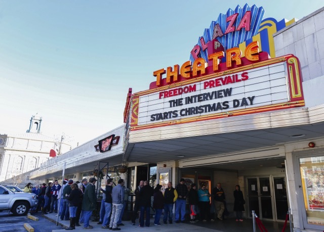 NOW SHOWING. People wait in line on Christmas day to watch the first screening of the controversial movie 'The Interview' at the Plaza Theatre in Atlanta, Georgia, USA, December 25, 2014. Photo by Erik S. Lesser/EPA