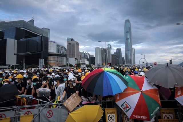 PROTEST. Protesters set up barricades at Lung Wo road outside the Legislative Council in Hong Kong before the flag raising ceremony to mark the 22nd anniversary of handover to China early on July 1, 2019.Â Photo by Vivek Prakash/AFP 