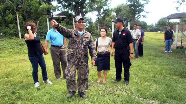 HIS HACIENDA? Vice President Jejomar Binay (in fatigues) tours guests around what is tagged as ‘Hacienda Binay’ in this undated photo. Photo from the Blue Ribbon subcommittee